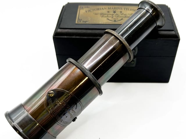Telescope in Wood Case.